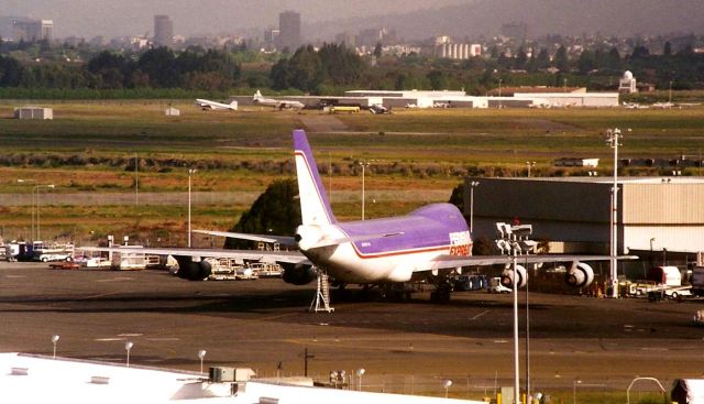 Boeing 747-200 (N806FT) - KOAK Fed Ex ramp area at Oakland - photo taken about 1989-90. View from the old tower lounge restaurant.