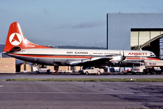 VH-RMB — - ANSETT AIR FREIGHT LOCKHEED L188A ELECTRA - REG : VH-RMB (CN 1047) - ADELAIDE INTERNATIONAL AIRPORT SA. AUSTRALIA - YPAD 13/9/1976 35MM SLIDE CONVERSION USING A LIGHTBOX AND A NIKON L810 DIGITAL CAMERA IN THE MACRO MODE.