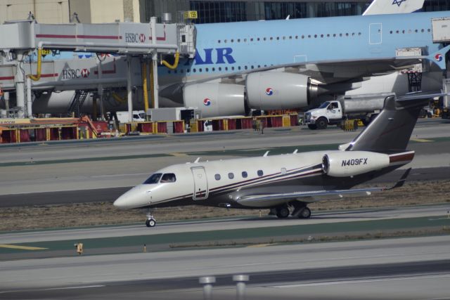 Embraer Legacy 450 (N409FX) - Just landed in Los Angeles, sorry for bad photo