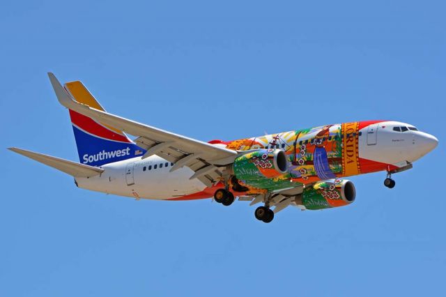 Boeing 737-700 (N945WN) - Southwest Boeing 737-7H4 N945WN Florida One at Phoenix Sky Harbor on July 19, 2018. Its vertical stabilizer has been repainted.