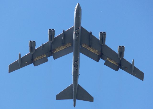 Boeing B-52 Stratofortress (60-0059) - At Barksdale Air Force Base. Landing gear is just starting to open. Empty weapons pods. Busy BUFF.