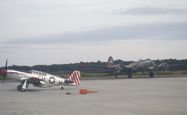 Boeing B-17 Flying Fortress (SAI93012) - Collins Foundation B-17 Nine O Nine returning to Charleston Executive Airport on 1 Nov 15 with P-51 Betty Jane on tarmac.  