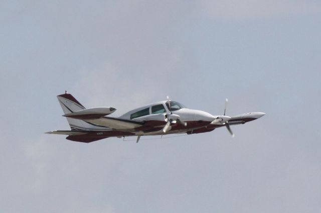 Cessna 310 (N7893Q) - 7893Q departs Runway 14 at Sarasota-Bradenton International Airport enroute to Kissimmee Gateway Airport