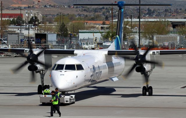 de Havilland Dash 8-400 (N404QX) - Pushing back for a noon hour flight to KPDX (Portland, OR).