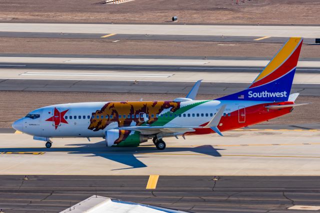 Boeing 737-700 (N943WN) - A Southwest 737-700 in California One special livery taxiing at PHX on 2/12/23 during the Super Bowl rush. Taken with a Canon R7 and Canon EF 100-400 II L lens.