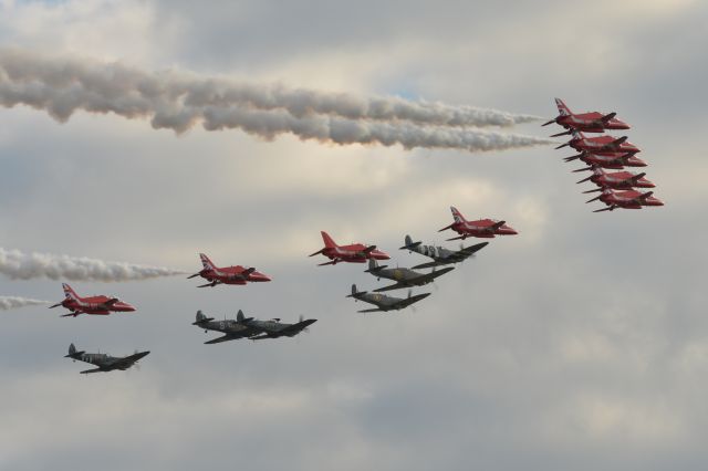 MULTIPLE — - The RAF aerobatic team "The Red Arrows" accompanied by 4 Spitfires and 2 Hurricanes of the Battle of Britain Memorial Flight at Duxford Airshow on 20 Sep 2015