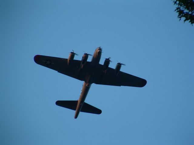 — — - Taken from my back porch. A once in a lifetime opportunity. My son and I heard the unmistakable sound of rotary engines from the kitchen table. Grabbed the camera, amazing!