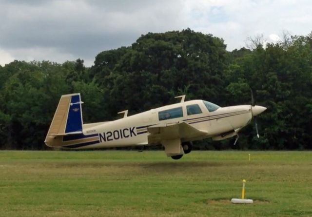 Mooney M-20 (N201CK) - Nice grass strip at the lake.