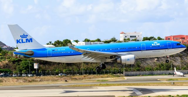 Airbus A330-200 (PH-AOE) - KLM Royal Dutch Airlines registration PH-AOE aka the flying dutch man with the Airbus A332 over the piano keys while landing at TNCM St Maarten.