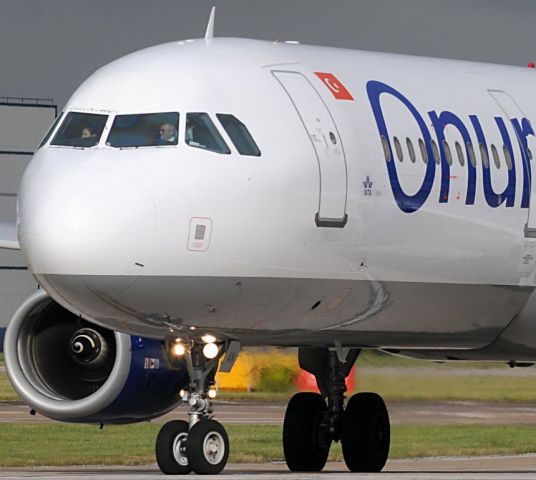 Airbus A321 (TC-OAN) - Onur Air pilots look to the oncoming storm in trepidation as they turn on to the runway to depart.