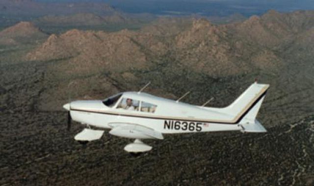 Piper Cherokee (N16365) - N16365 over Avra Valley, Arizona just north of Ryan Airfield. Tucson Mountains in the background.