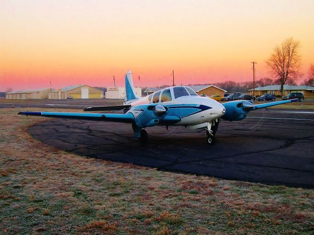 Beechcraft Travel Air (N210SK) - BE95 Travel Air warming up on a chilly frosty morning. 