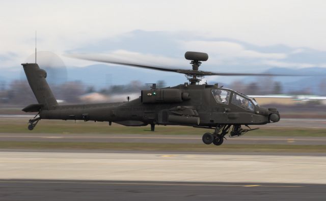 1403013 — - Flight of 3 AH-64Es departing MFR for the South. 2/6/16