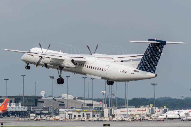 de Havilland Dash 8-400 (C-GKQI) - Porter 455 leaving Montreal for Halifax. Would you want to be on a Dashie for almost 2 hours? I know I wouldn't!