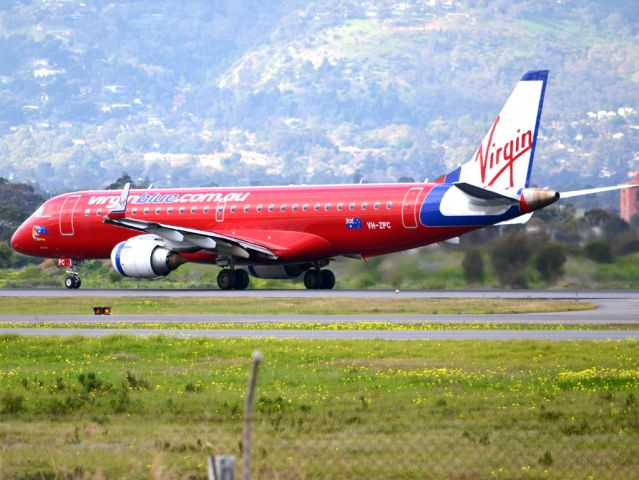 Embraer ERJ-190 (VH-ZPC) - Rolling for take off on runway 05. Thursday 12th July 2012.