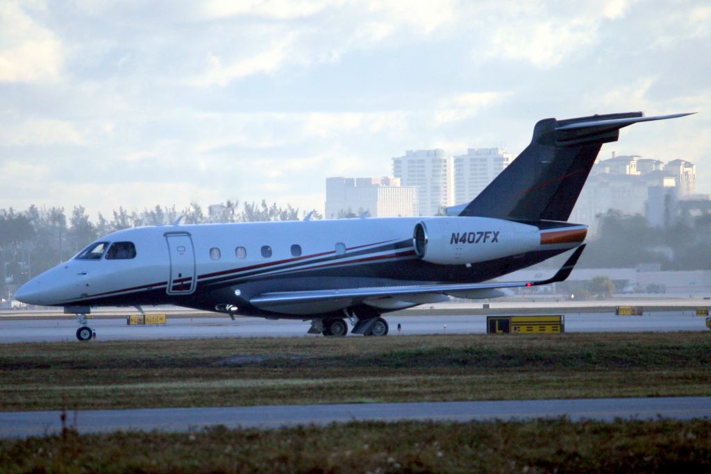 Embraer Legacy 450 (N407FX) - Flexjet Legacy 450 lining up to depart rwy 10L on 6-Feb-19 heading for KCHO as LXJ407.