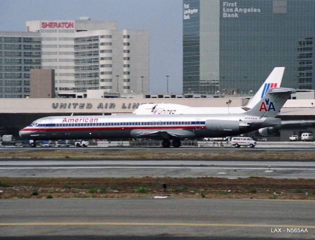 Cessna 152 (N565AA) - KLAX - MD-80 departing 25R at LAX - early 1990s. I took this from the old FedEx parking lot