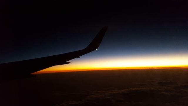 Airbus A321 — - Atardecer sobre el oceano pacifico