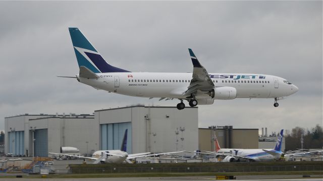 Boeing 737-800 (C-FWVJ) - BOE499 on final to runway 16R for a touch/go landing on 12/8/11.