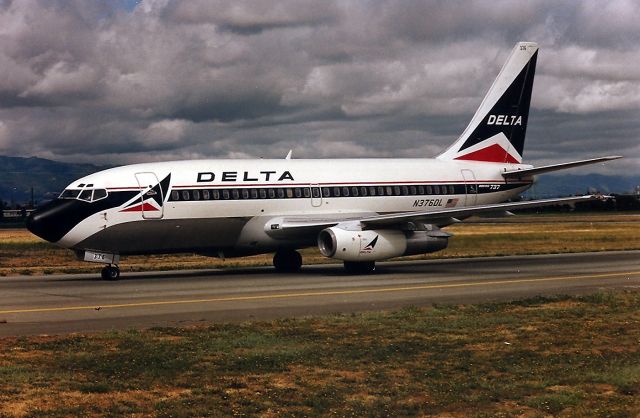 Boeing 737-200 (N376DL) - KSJC - Mar 1988 shows Delta 737 200 arriving from KSLC on an early saturday morning. The parking lot I took this photo from was out by the taxiways as the then new Terminal A was being built. I used to film here almost every weekend - the Cops never once hassled me as I was even in the back of my pickup truck atop an 8 ft ladder.