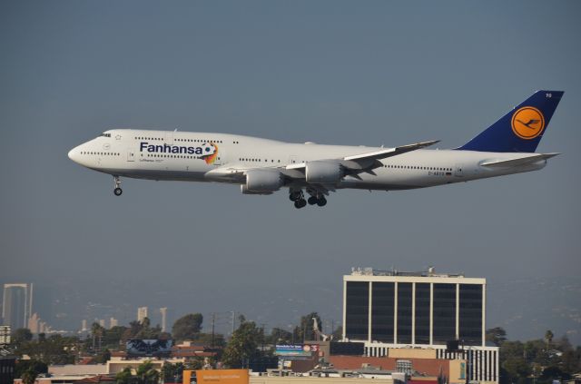 Boeing 747-200 (D-ABYO) - "Fanhansa" on short-final into LAXs Runway 24R as seen from a parking garage just southeast of the 24 runways.