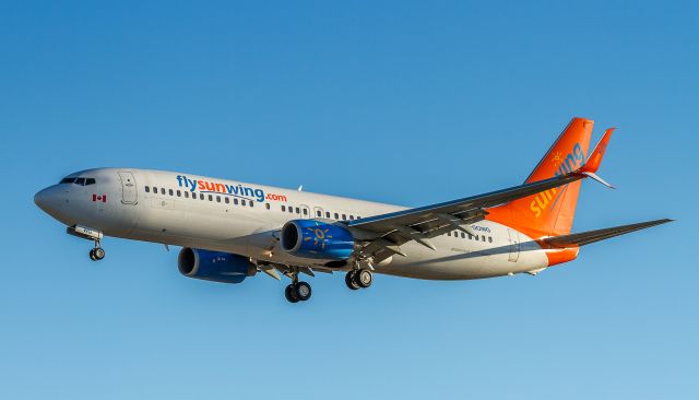 Boeing 737-800 (C-GOWG) - Sunrise spotting as Sunwing806 arrives from Vancouver