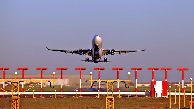 Airbus A330-300 (F-HPUJ) - Take off. View from the threshold of runway 06