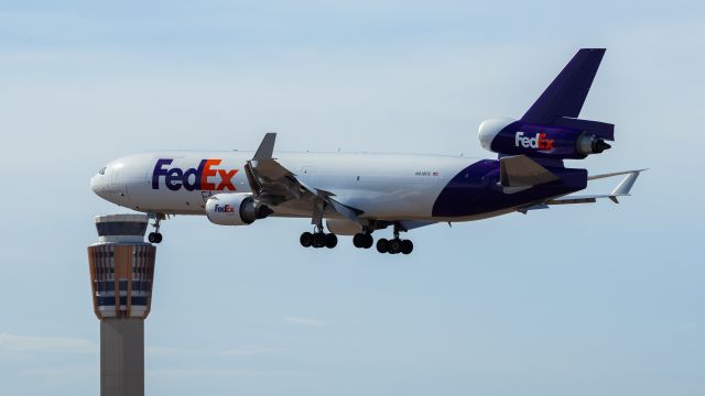 Boeing MD-11 (N618FE) - FedEx MD11 landing at PHX on 8/9/22. Taken with a Canon 850D and Rokinon 135mm f/2 lens.