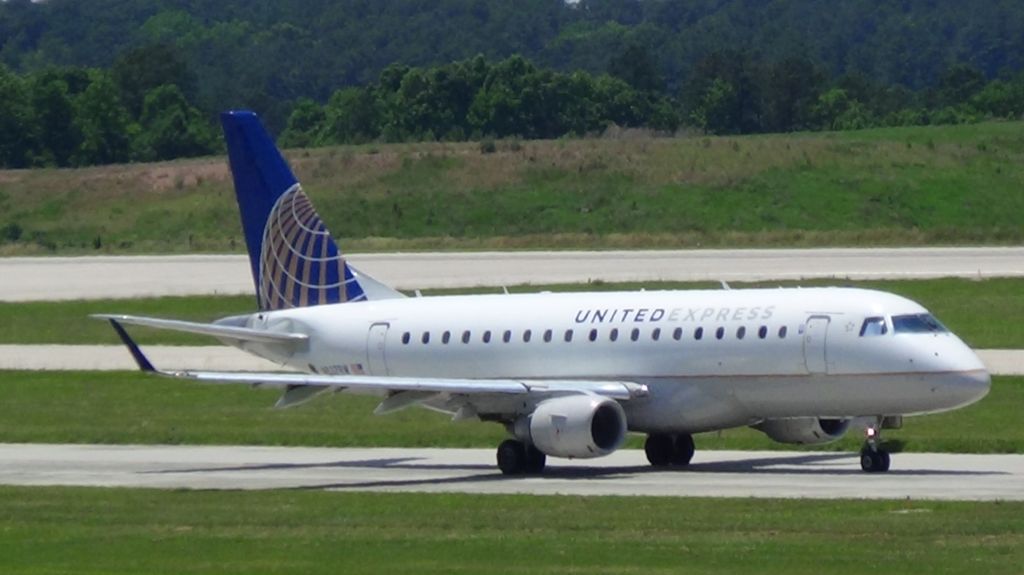 N827RW — - United Express (Shuttle America) 3441 departing to Newark at 1:36 P.M.   Taken June 7, 2015.  