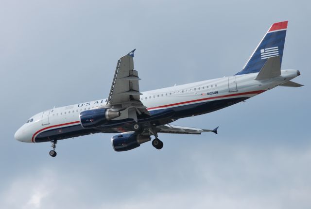 Airbus A320 (N125UW) - Final for runway 23 at KCLT - 10/29/14