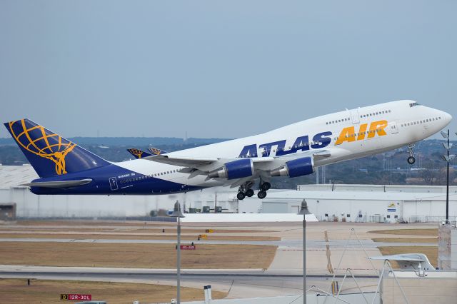 Boeing 747-400 (N464MC) - Rare catch for SAT.