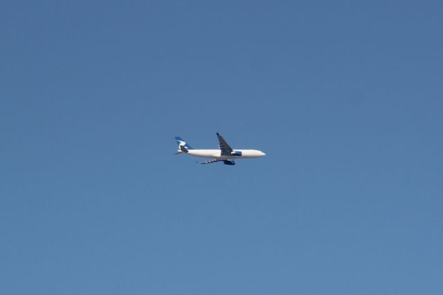 Airbus A330-200 (CS-TFZ) - LOT 1 from Warsaw on approach to Runway 10 at KORD, viewed from Elgin IL.  Aircraft is being wet-leased by LOT from Hi Fly, but it is in Livingston Compagnia Aerea livery.