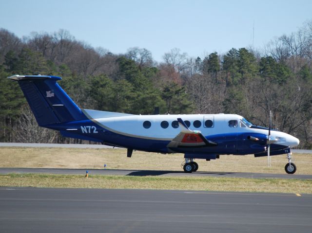 Beechcraft Super King Air 200 (N72) - FEDERAL AVIATION ADMINISTRATION new livery and winglets for their King Air fleet. Orange paint on top and bottom of wings with the words "FLIGHT" and "CHECK" painted in black at KJQF - 2/1/13