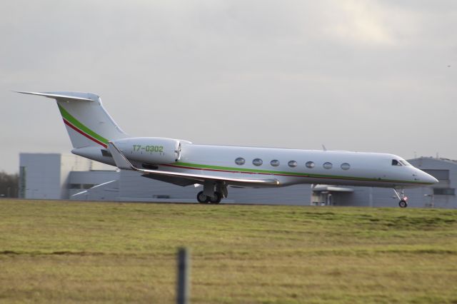 Gulfstream Aerospace Gulfstream V (T70302) - A Privately Owned Gulfstream G550 taking off from London Stansted Airport, on runway 22.br /br /Location: London Stansted Airport.br /Date: 21.12.22 (dd/mm/yy).