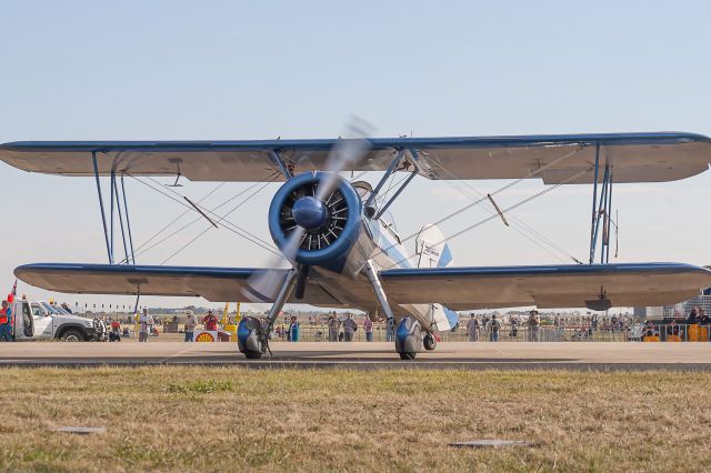 — — - Eddie Andreini in a Stearman Model 75 at Avalon Air Show in 2005.