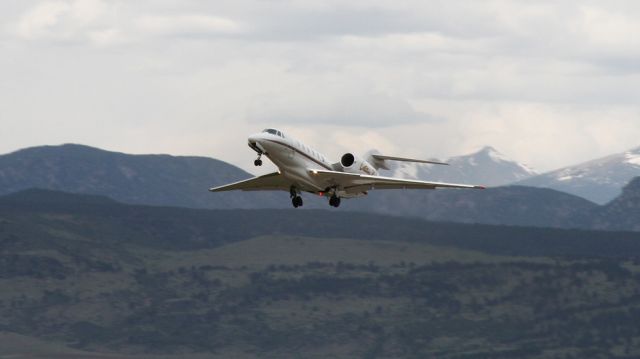 Cessna Citation X (EJA953) - A rare visitor to LMO - it was airborne in no time!