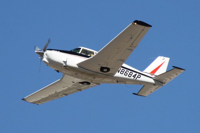 Piper PA-24 Comanche (N8684P) - Climbing out of Flagstaff Pulliam Airport, November 2 2018.