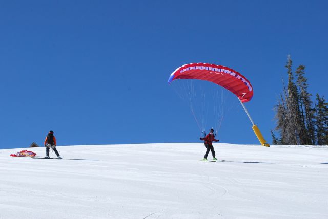 — — - Paraglider taking off from baldy Ski hill in Sun valley, Idaho