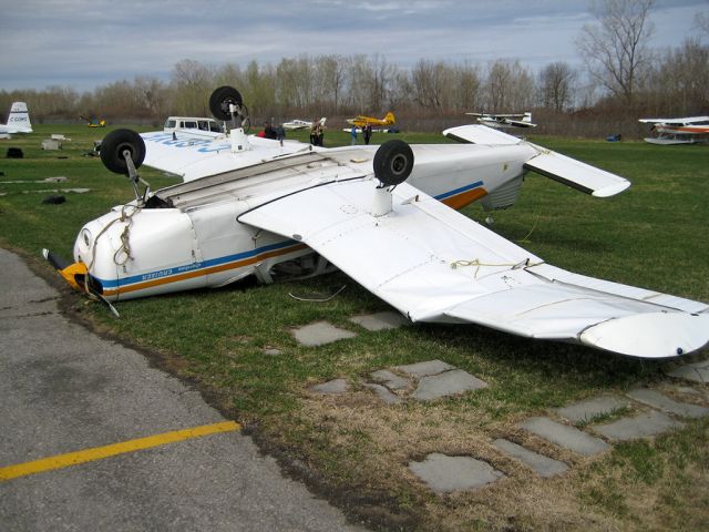 Piper Cherokee (C-GDYE) - High winds and an unconfirmed F0 tornado ripped through CYRO on Saturday  April 25, 2009.  This aircraft was actually found lying in the middle of the runway and was dragged back during the clean-up.  11 airplanes are write-offs and another 11 suffered minor damage