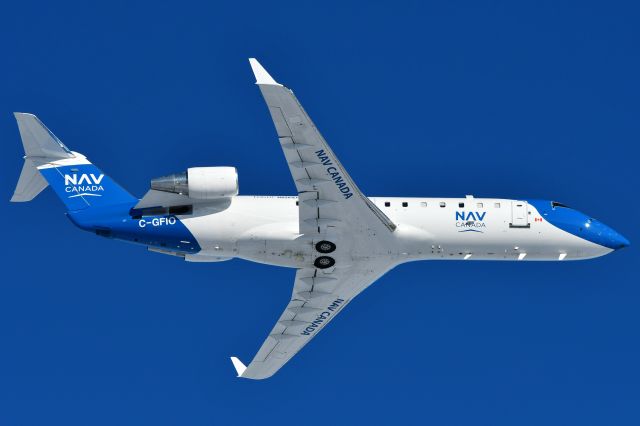 Canadair Regional Jet CRJ-200 (C-GFIO) - Nav Canada Bombardier CRJ-200ER doing instrument calibration at YYC on Nov 25.