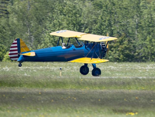 N55361 — - Very good stick and rudder work in a strong, gusting wind.