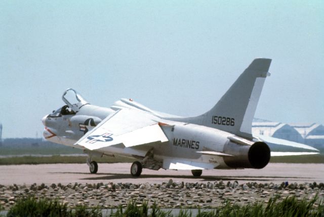 — — - F8U Crusader on the flightline at MCAS Iwakuni, Japan 1967