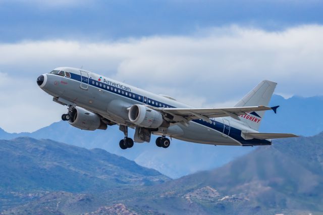 Airbus A319 (N745VJ) - An American Airlines A319 in Allegheny retro livery taking off from PHX on 2/14/23. Taken with a Canon R7 and Canon EF 100-400 II L lens.