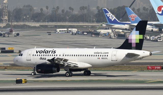 Airbus A319 (N502VL) - Arrived at LAX on 25L