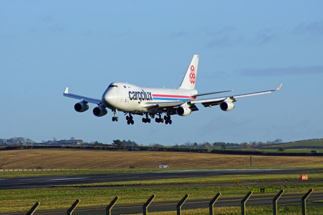 Boeing 747-400 (LX-WCV) - Over the threshhold of runway 31 at Glasgow Prestwick International Airport.