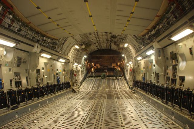 — — - Interior shot of cargo bay of C-17 "heavy" at Gary Regional Airport.