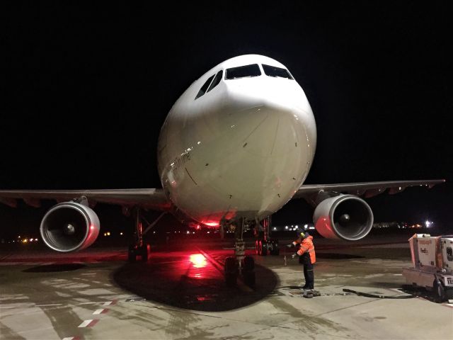 Airbus A300F4-600 (N669FE) - Catching the Beacon and 2 ft. more roll for the nose wheel before wheel chalking "Kaitlyn" in. Engines will run another minute before shut down. 