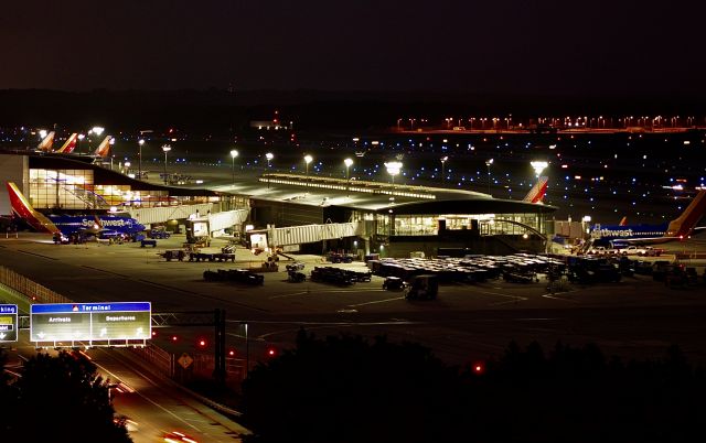 — — - A night-scape of BWIs concourse A, inhabited by Southwest solely.