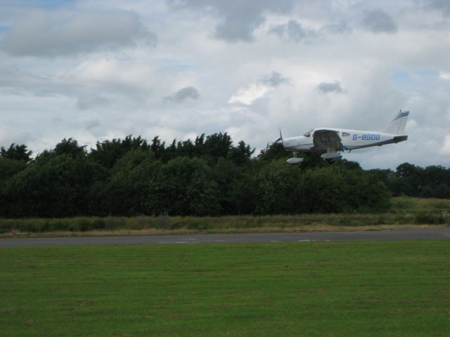 Piper Cherokee (G-BGOG) - G-BGOG landing from a flight from Cranfield