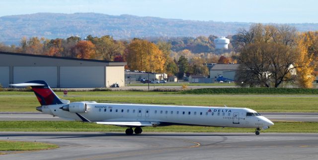 Canadair Regional Jet CRJ-900 (N326PQ) - Taxiing for departure is this 2014 Delta Airlines Connection Canadair Regional Jet 900LR in the Autumn of 2022. My 8000th posting.